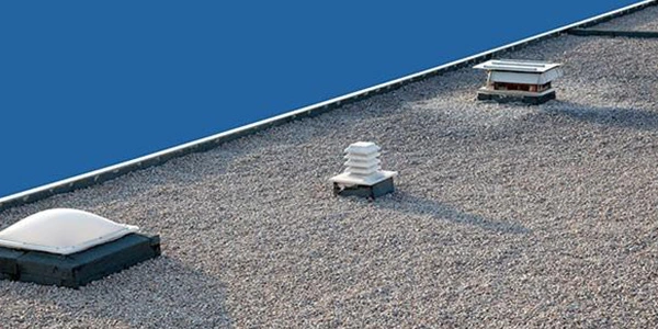 Étanchéité toit terrasse : finition gravier